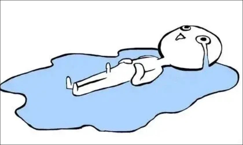 Ảnh meme người đàn ông gục mặt trên bàn