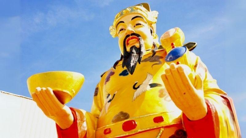 Ảnh nền Thần Tài phúc hậu với râu dài và nụ cười