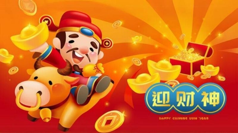 Ảnh nền Thần Tài với ánh sáng vàng rực rỡ và thỏi vàng