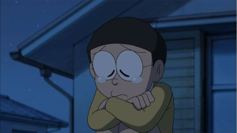 ảnh nobita ngồi thu lu một góc buồn