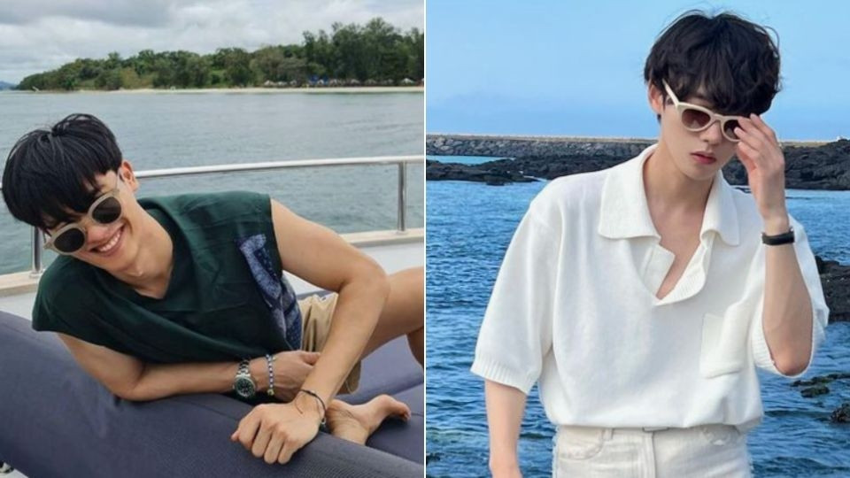 Chàng trai đeo kính cười dễ thương trên biển