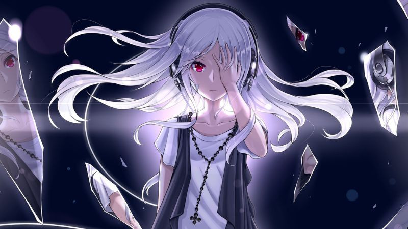 Cô gái anime tóc tím ngồi trước màn hình máy tính