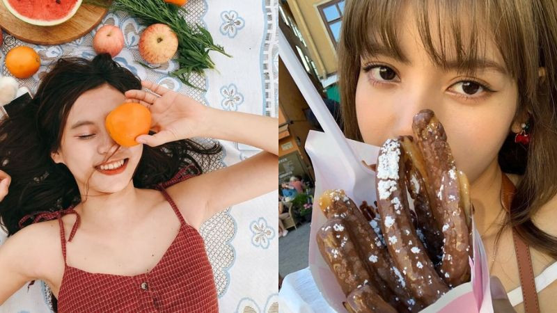 Cô gái dùng lát cam che một phần mặt khi chụp ảnh dáng đẹp che mặt