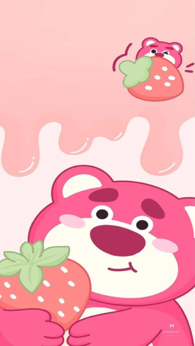 Gấu dâu nhỏ nhắn ngồi cạnh quả dâu tây lớn