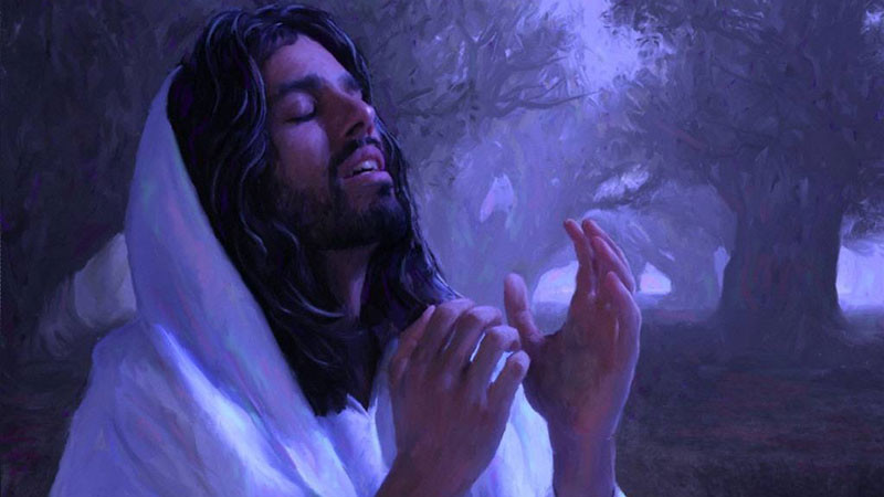 Hình ảnh Chúa Giêsu đang quỳ gối cầu nguyện trong đêm tối
