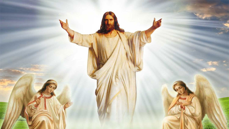 Hình ảnh Chúa Giêsu phục sinh bước ra từ ngôi mộ với hào quang