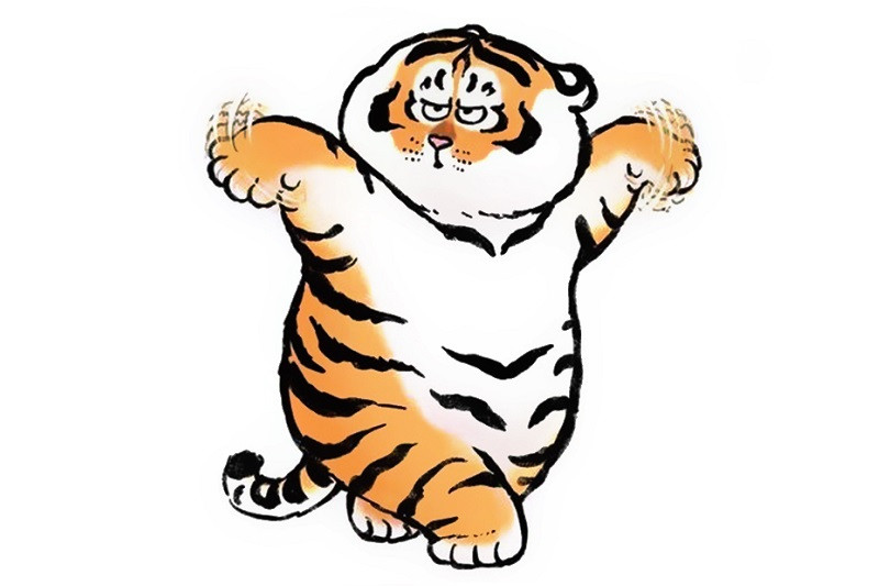 Hình ảnh hổ con đang nhìn đầy tò mò và đáng yêu