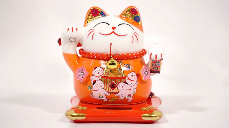 Hình ảnh mèo thần tài cách điệu với màu sắc hiện đại, phù hợp làm hình nền máy tính