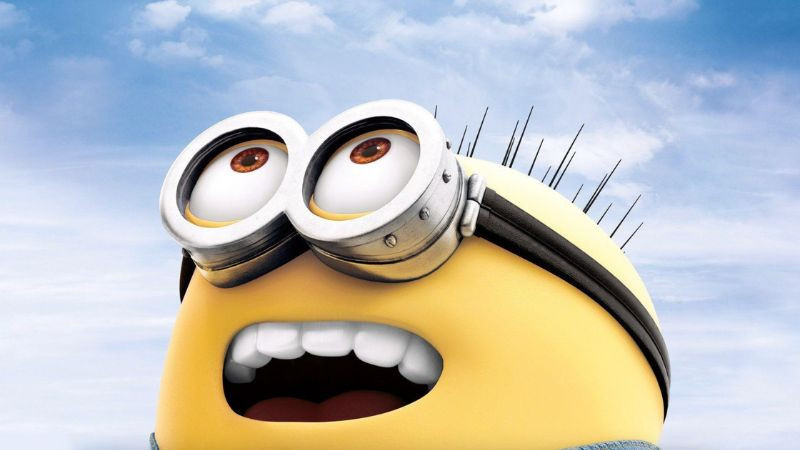 Hình ảnh Minion đeo kính bảo hộ và yếm bò vui vẻ tạo dáng