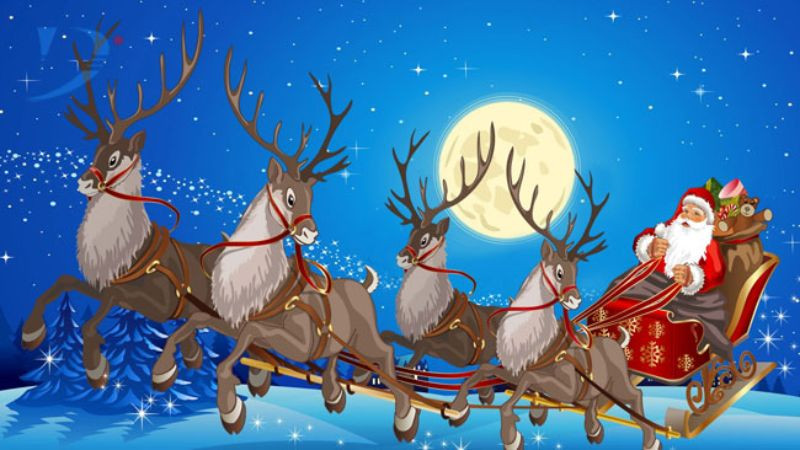 Hình ảnh ông già Noel ngồi cạnh cây thông
