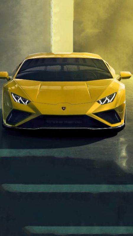 Hình ảnh siêu xe Lamborghini màu đen dưới ánh đèn đêm