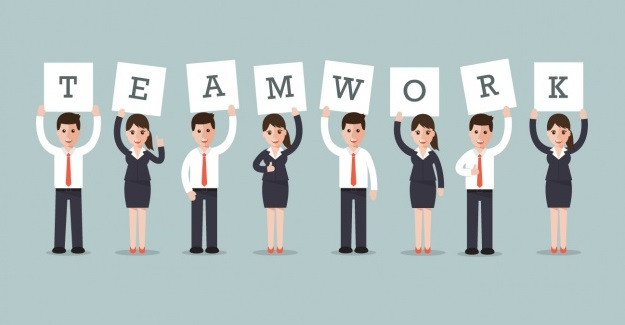 Hình ảnh tượng trưng cho tinh thần đồng đội và làm việc nhóm (teamwork) để đạt mục tiêu chung.