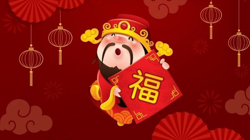 Hình nền Thần Tài ngồi giữa bao lì xì đỏ rực