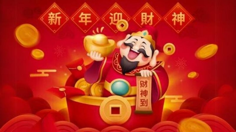 Hình nền Thần Tài với nụ cười tươi tắn và thỏi vàng