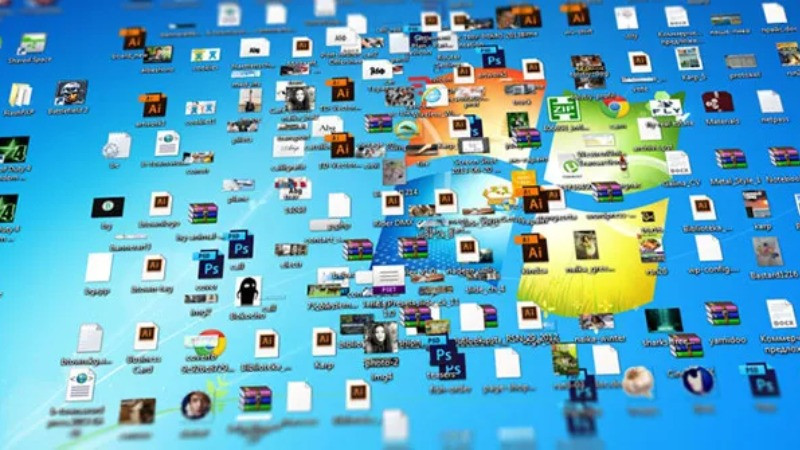 Màn hình máy tính lộn xộn với quá nhiều file và folder chưa được sắp xếp