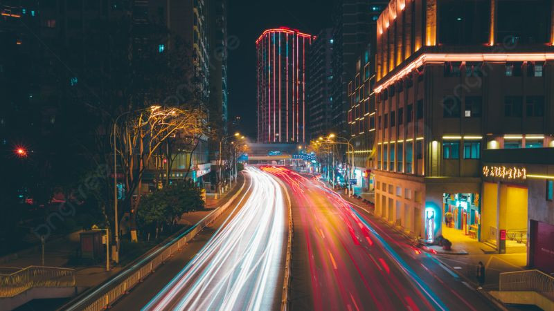 Một góc phố đêm tấp nập ánh đèn và xe cộ