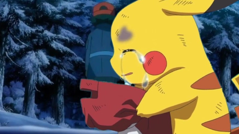 Pikachu ngồi trầm ngâm, ánh mắt đượm buồn