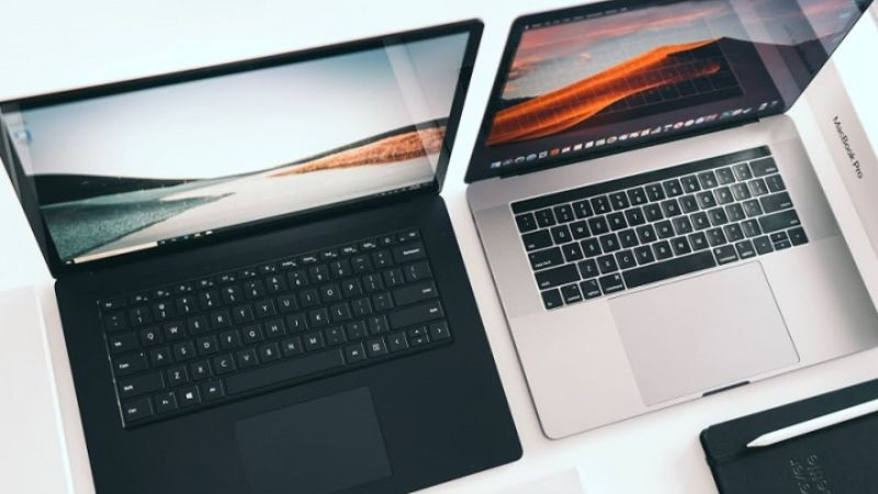 So sánh cấu trúc phần cứng và phần mềm tối ưu trên MacBook (trái) với đa dạng cấu hình trên laptop Windows (phải)