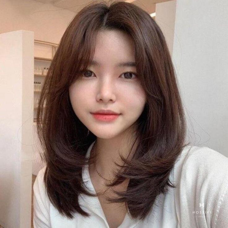 Tóc mái bay layer tạo độ phồng và cảm giác dày dặn cho mái tóc mỏng