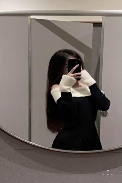 Ảnh girl che mặt lạnh lùng với ánh mắt bí ẩn dưới bóng tối