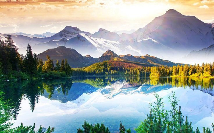 Phong cảnh núi non hùng vĩ với thung lũng xanh mướt làm hình nền